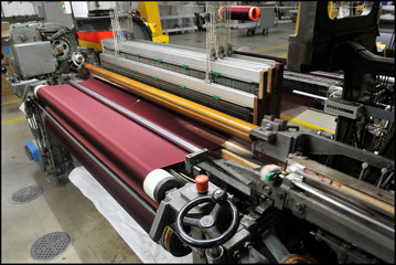 Textile industry with knitting machines in factory - italian - made in Italy 