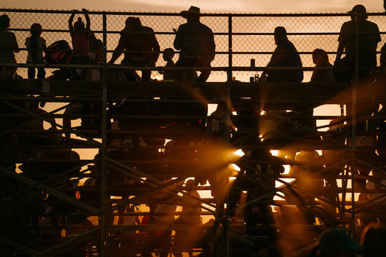 Sunset At Rodeo Grounds Through The Bleachers