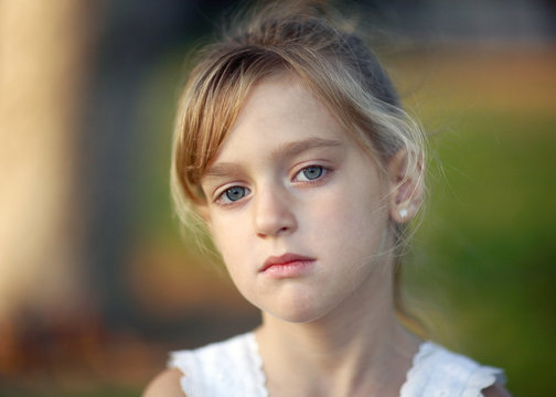 Beautiful Portrait Of Little Girl With Hazel Eyes