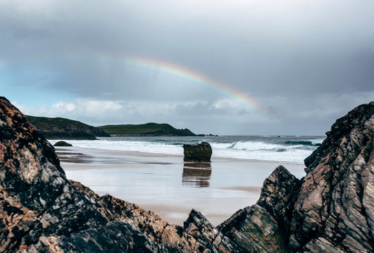 Rainbow over Sango Sands Bay. Durness, Highlands, Scotland, UK.