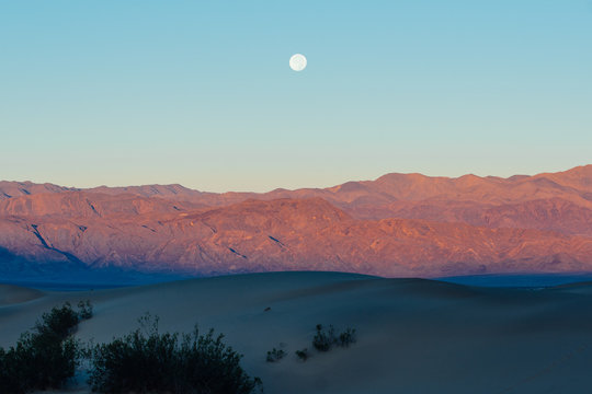 Bright Moon upon the Silhouette of Mountains