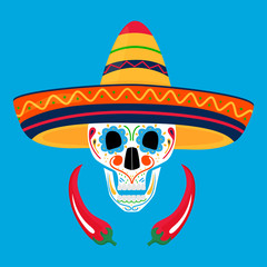 Painted sugar skull in sombrero and with chili. Day of the Dead in Mexico. Dia de los Muertos