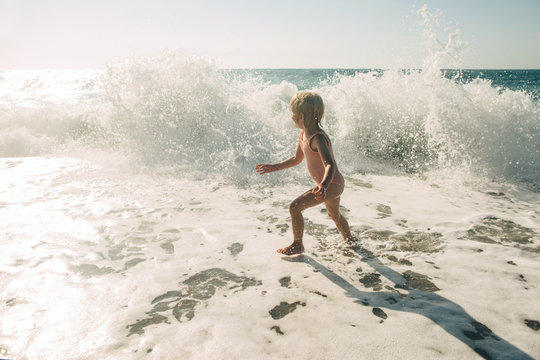 Child in waves