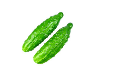 Green cucumbers on a white background isolate
