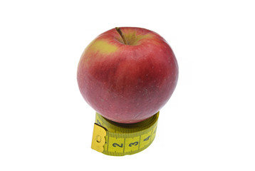 red apple with measuring tape isolated on white background