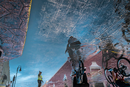 Reflection of street in puddle