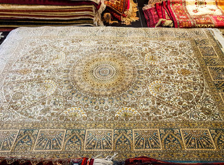 Handmade carpets. Production of silk carpets in Uzbekistan.