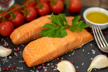 Cooked salmon fish fillets with spices, selective focus