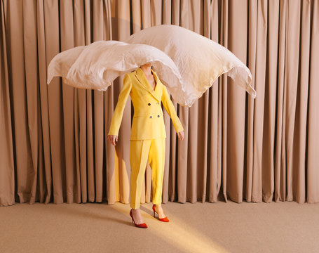 Woman hiding her face with cloth