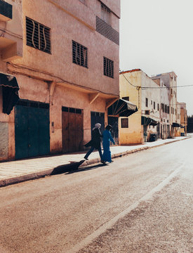 Two Muslim Women Crossing Road