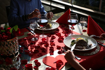 red wine and meat dish in a restaurant