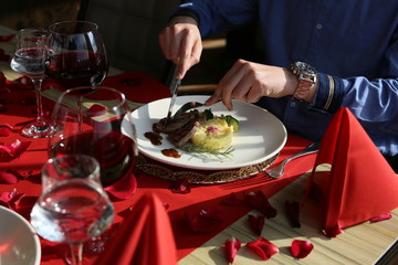 red wine and meat dish in a restaurant