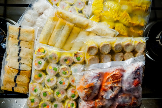 Image Of Stock Of Frozen Oriental Dim Sum Food Stacked On Stove