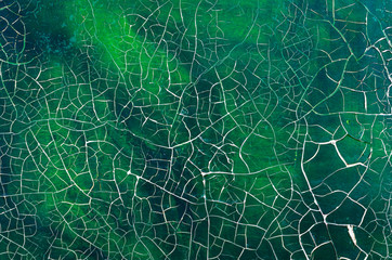 cracked paint on old picture close up