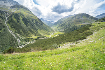 Fototapeta na wymiar Beautiful valley and alpine landscape