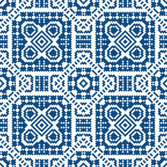 Seamless pattern in ethical style. The motif is made in the technique of pixel art.