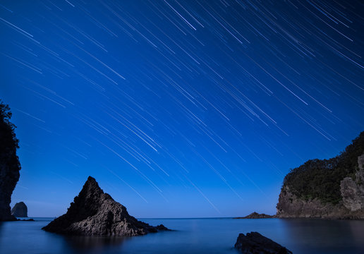 Star trails over the sea at Futou coast in Izu peninsula, Shizuoka Prefecture, Japan