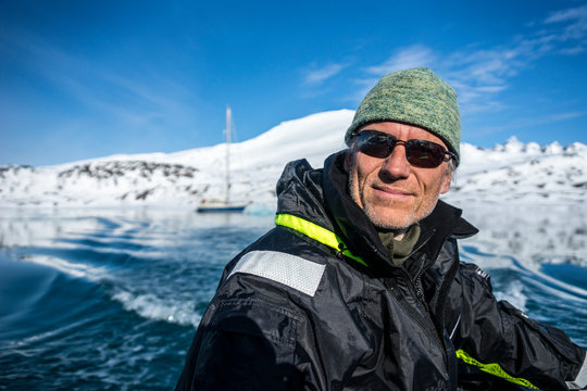 Portrait of man on boat in Jan Mayen