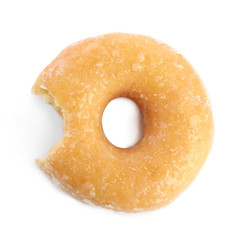 Sweet delicious glazed donut isolated on white, top view