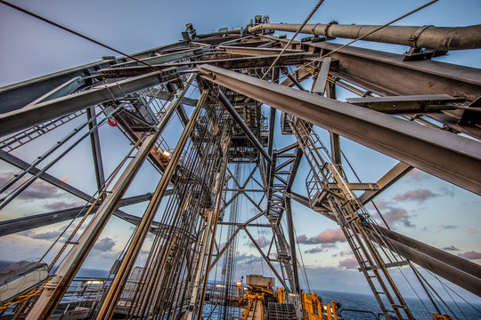 Offshore Drilling during sunset in the Gulf of Mexico