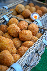 Traditional street food in UK, stuffed Scottish eggs with breadcrumbs