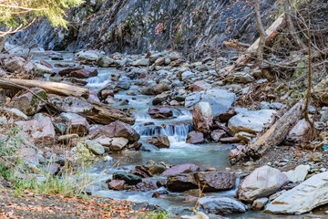 Motion Blur Waterfalls Peaceful Nature Landscape. Waterfall at small river near Rosa Khutor resort in Caucasus mountains