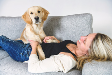A woman with her golden Retriever dog