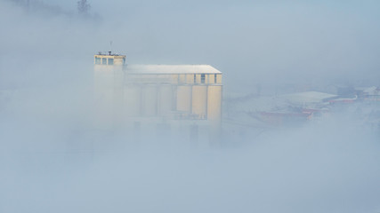 food company peeks through fog