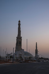 Fototapeta na wymiar The building of Sheikh Khalifa Bin Zayed Al Nahyan Mosque in Al Ain at sunset, may 2019. UAE