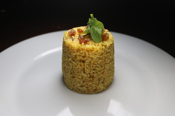 simple cup rice plate with plams, mint leaf close up image