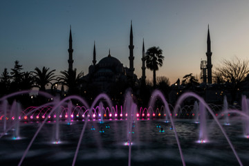 ISTANBUL, TURKEY - JANUARY 1, 2019:  Park in Sultanahmet Square with the fountain, in Istanbul, Turkey.