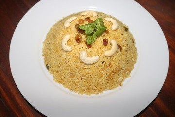 cashew nut, plams ingredients on rice plate