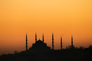 Sunset with sun behind silhouette in Istanbul,Turkey