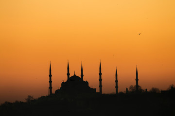 Sunset with sun behind silhouette in Istanbul,Turkey