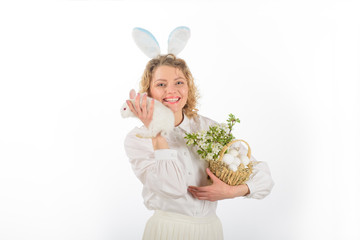 Eggs hunt. Easter egg. Bunny. Rabbit ears. Easter. Girl in bunny ears holds basket with eggs and Easter bunny. Religion symbol. Basket with eggs. Spring holiday. Happy Easter day.