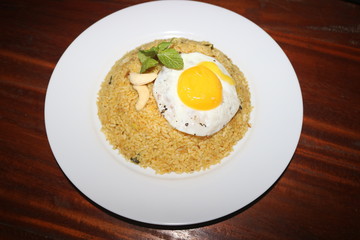 yellow rice with egg omelette dish image