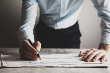 man hand pen with document