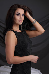 Fototapeta premium Portrait of a beautiful woman in an evening dress