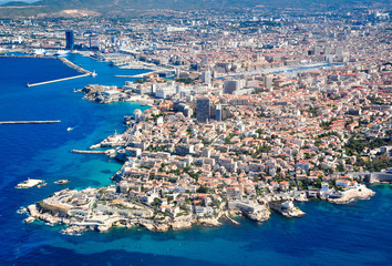 Beautiful aerial shot of the seafront of Marseille with Malmousque district and the Vieux Port, on a superb summer day with turquoise sea