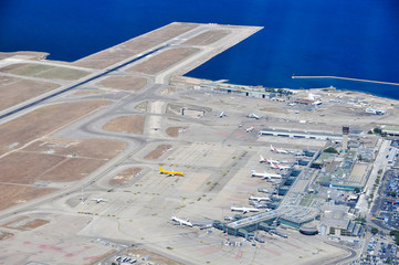 Fototapeta na wymiar Aerial shot when overflying the tarmac, runways and terminal of Marseille Provence international airport