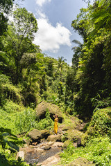 Relaxed young tourist enjoying sounds of nature