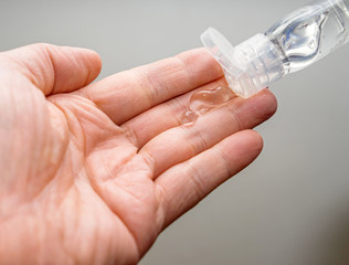 Cleaning hand with sanitiser gel