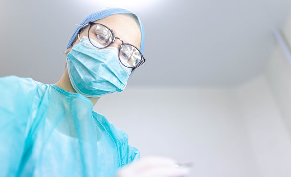 young girl intern doctor in a medical office.