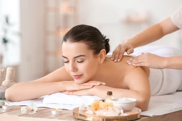 Foto auf Acrylglas Beautiful young woman receiving massage in spa salon © Pixel-Shot