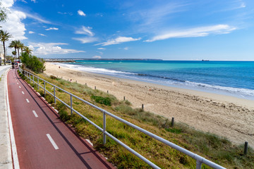Bike path on the promenade of Palma de Mallorca. Seafront of the Palma de Mallorca.