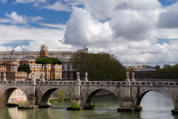 Stone bridge on river near Castel Sant'Angelo in Rome. Italy