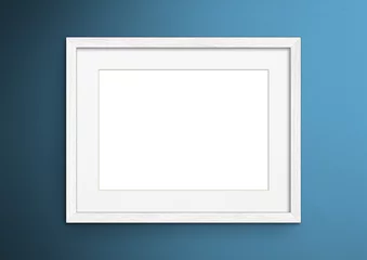 Deurstickers Empty frame. Blank white mounted landscape frame on blue wall © Ifan