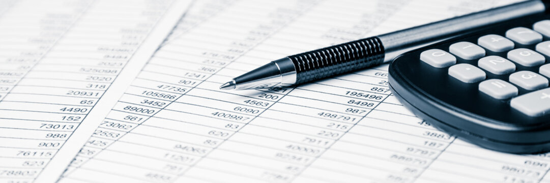 Accounting And Business Concept With Pen And Calculator