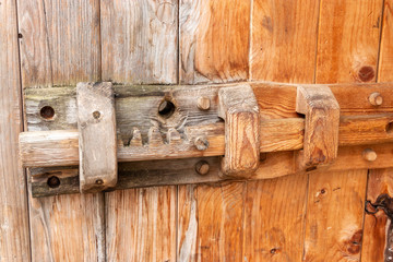 A wooden sliding lock