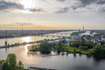 Aerial view photo from flying drone panoramic view of Riga's bridges, the Daugava River, the TV...